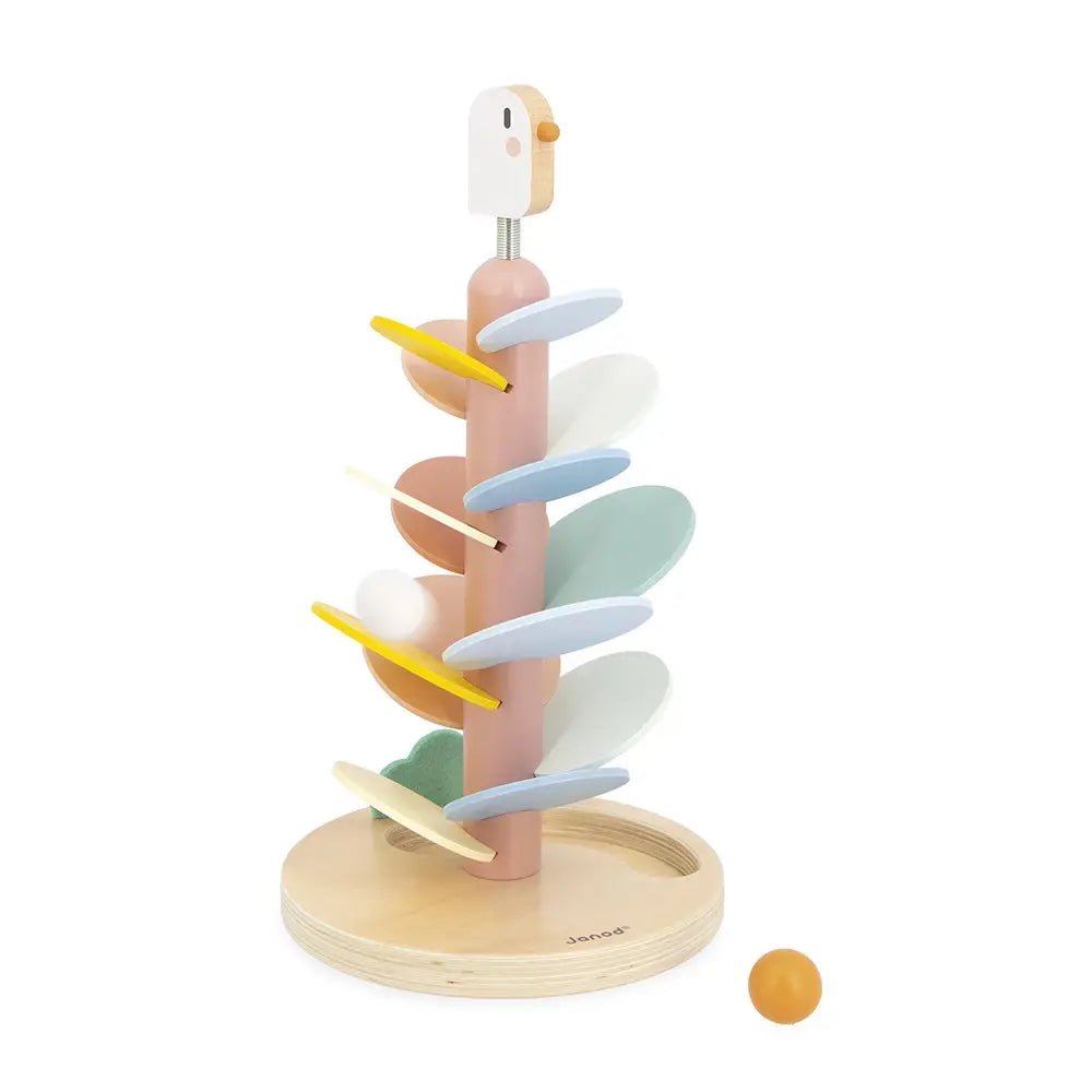 Wooden toy with colorful spiral design on a white background