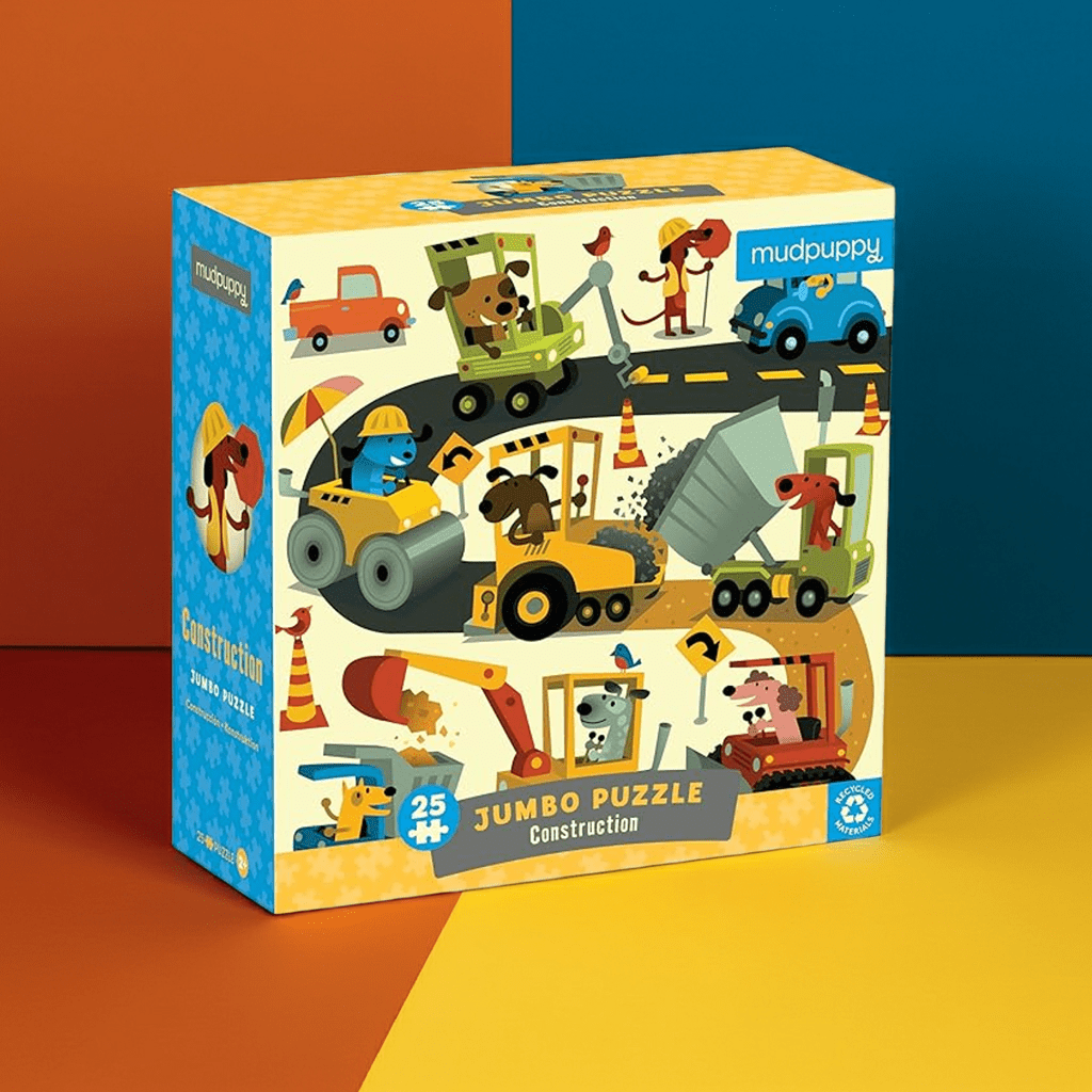 Mudpuppy construction jumbo puzzle box on a colorful background