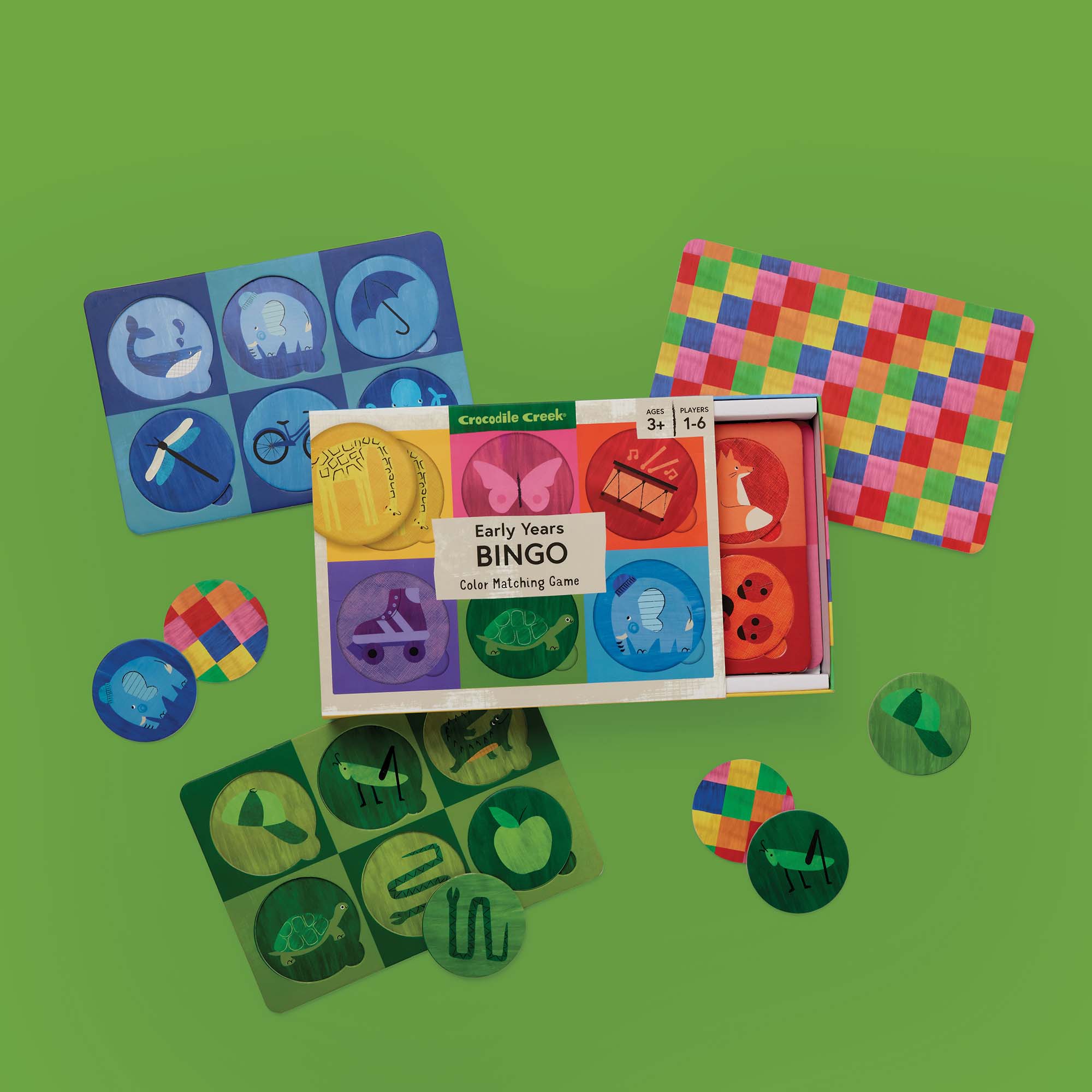 Colorful educational game set on a green background