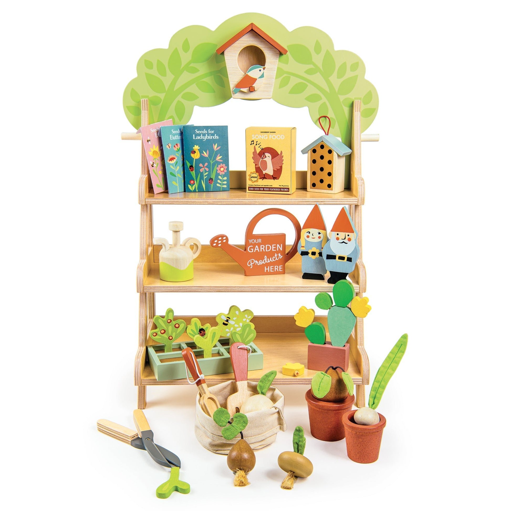 Toy garden set with shelves, books, and gardening tools on a white background