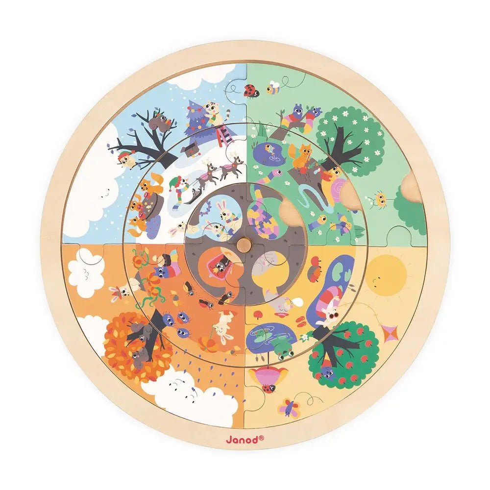 Round wooden puzzle with colorful animal illustrations on a white background, featuring the Janod brand.