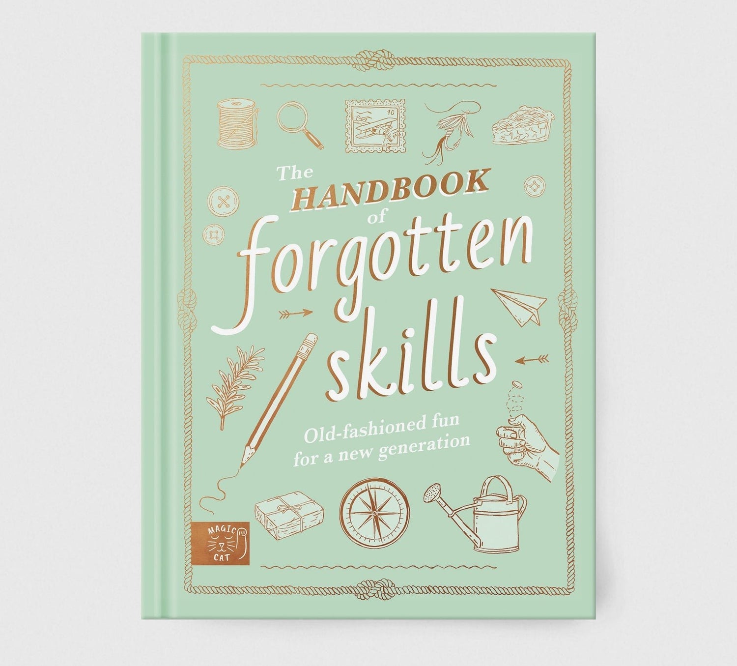 Book titled 'The Handbook of Forgotten Skills' on a light green background