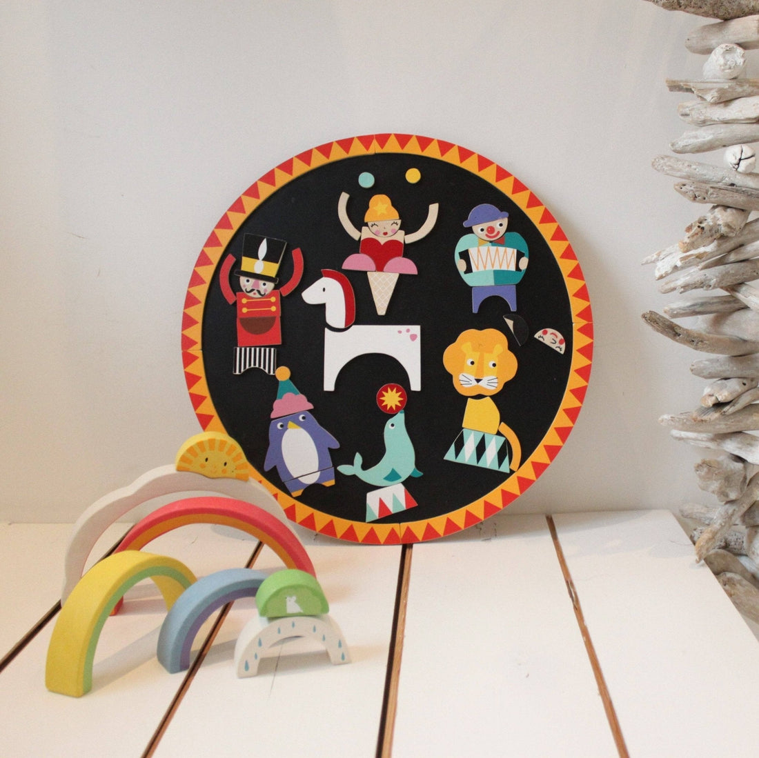 A colourful wooden toy in a child's playroom