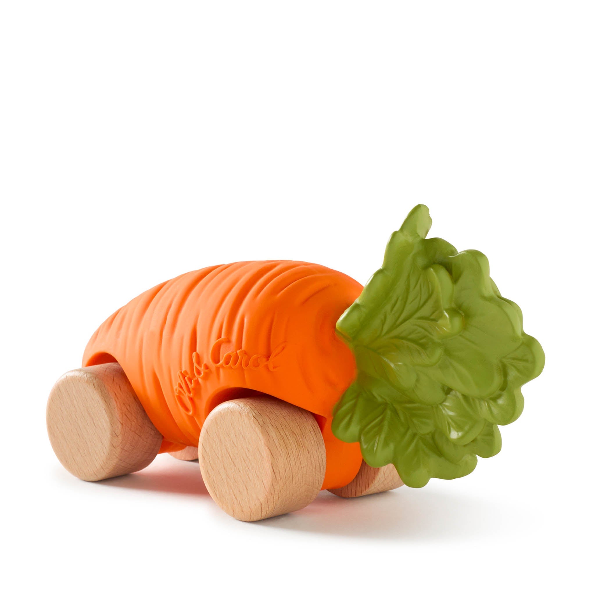 Carrot-shaped toy with wooden wheels and green leaf on a white background