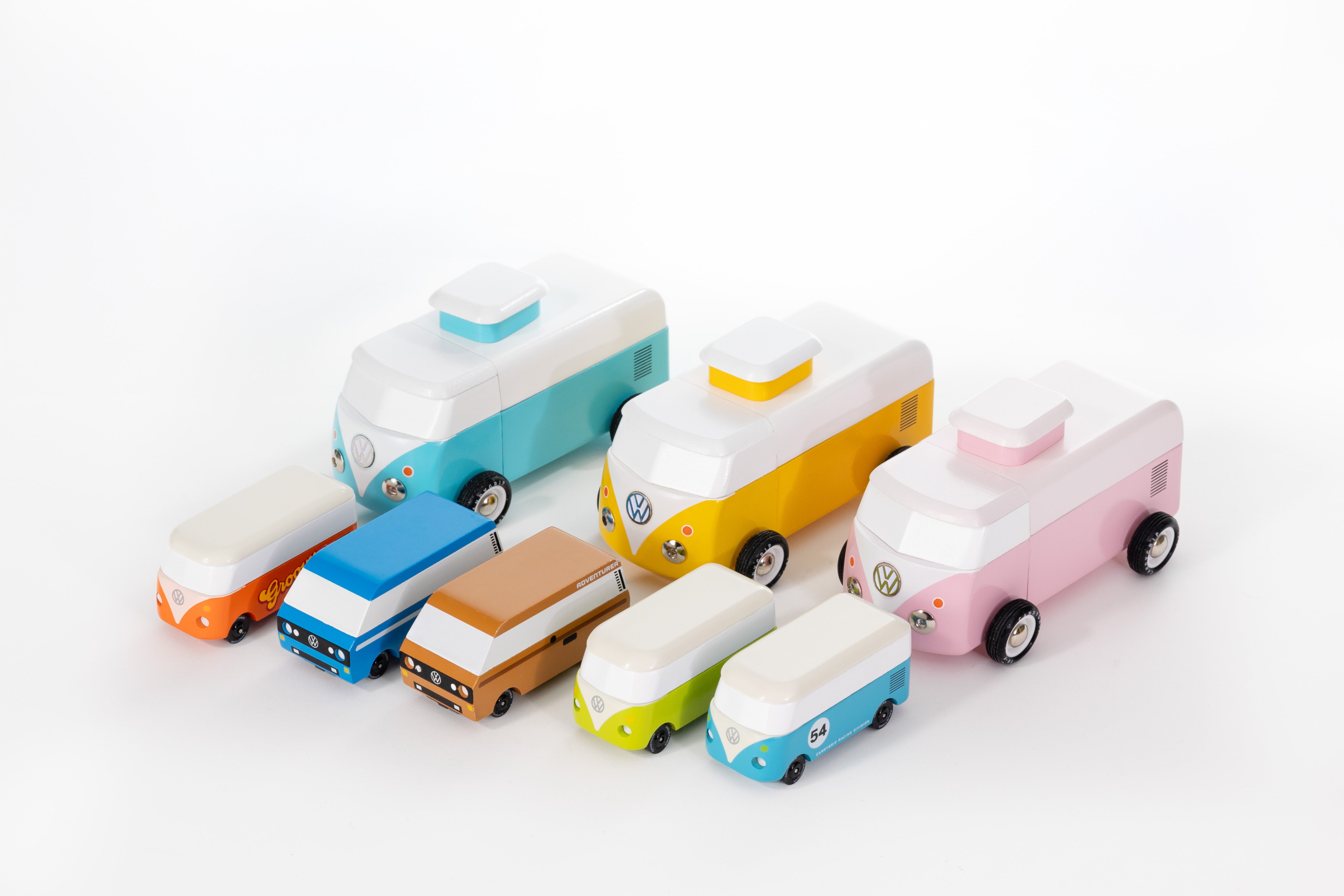 Set of colorful toy vans on a white background