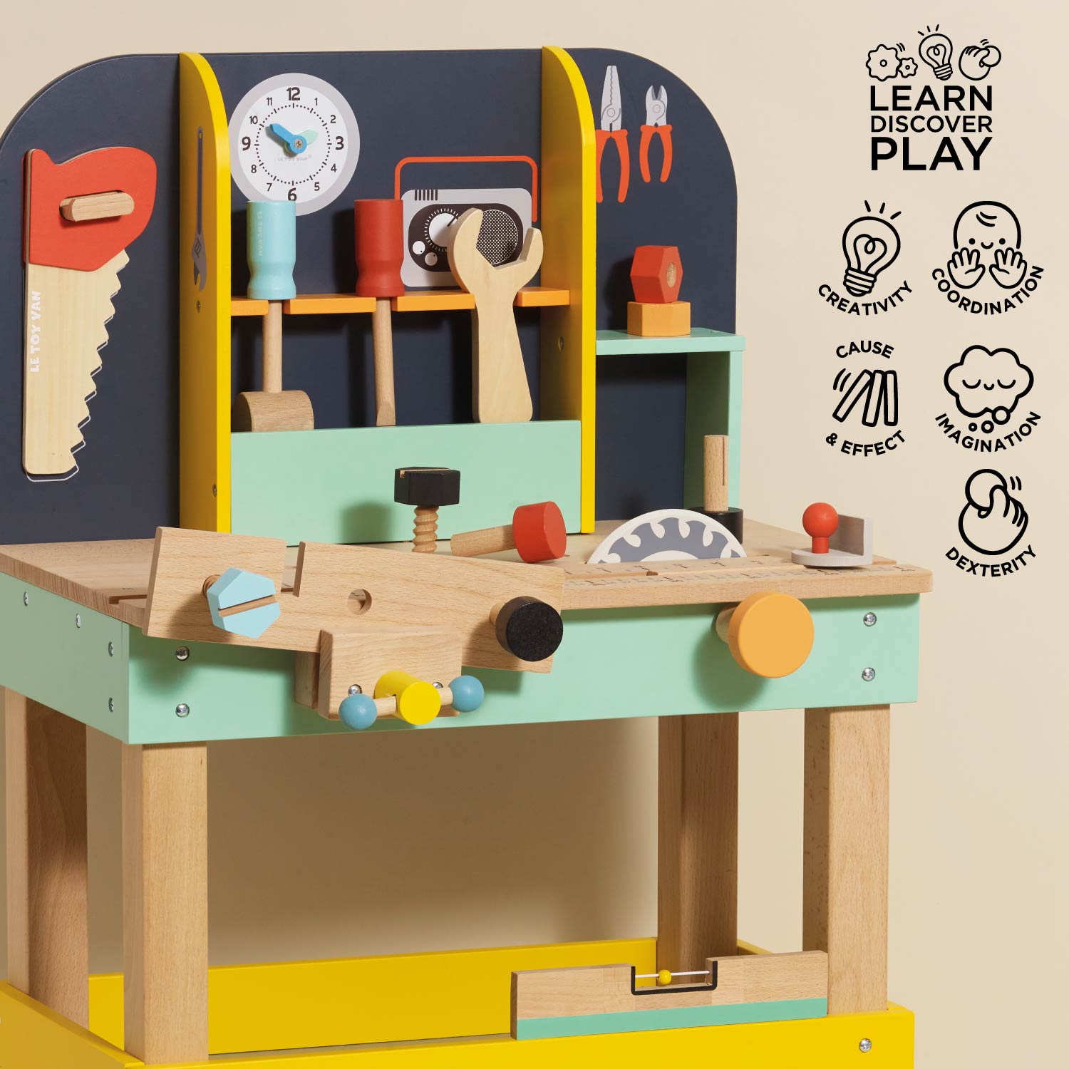 Children's wooden playworkshop with tools and shelves on a beige background