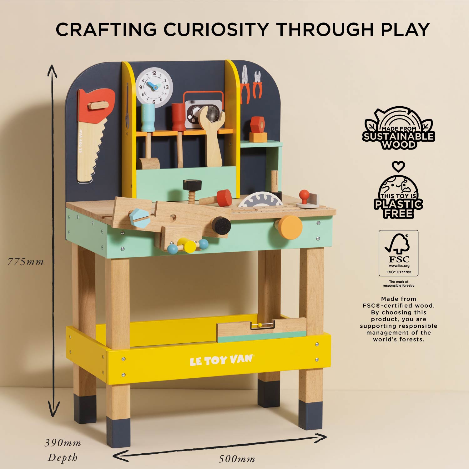 Children's wooden playworkshop with tools and shelves, featuring Le Toy Van branding and sustainability certifications.
