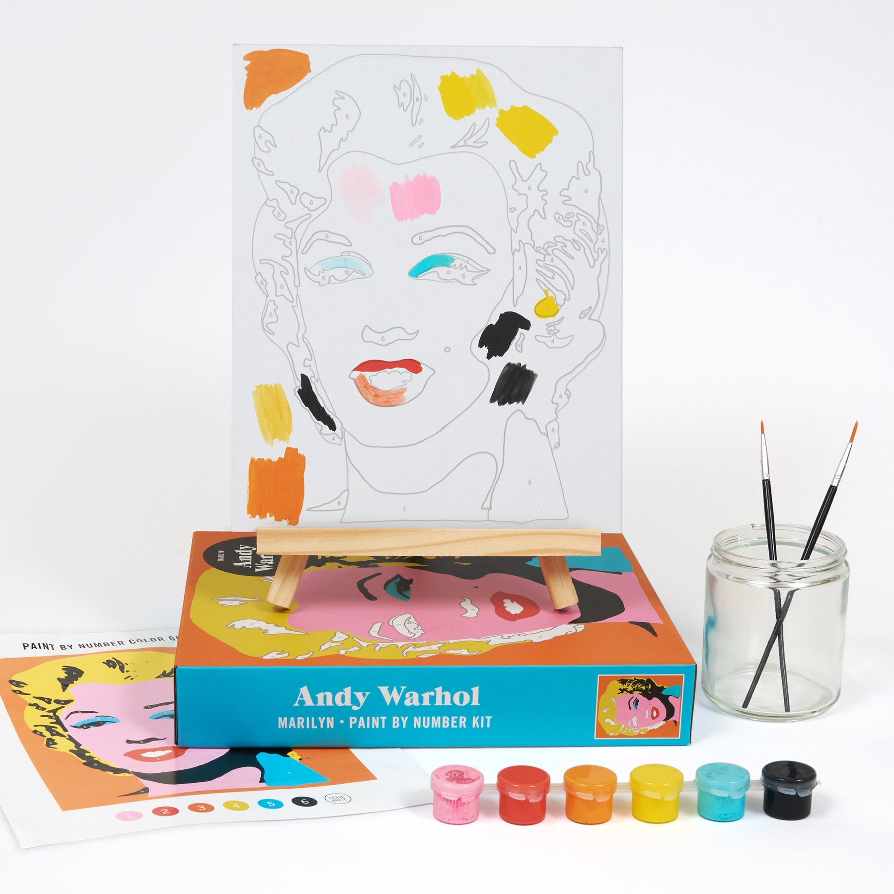 Andy Warhol Marilyn Monroe paint by number kit with art supplies on a white background