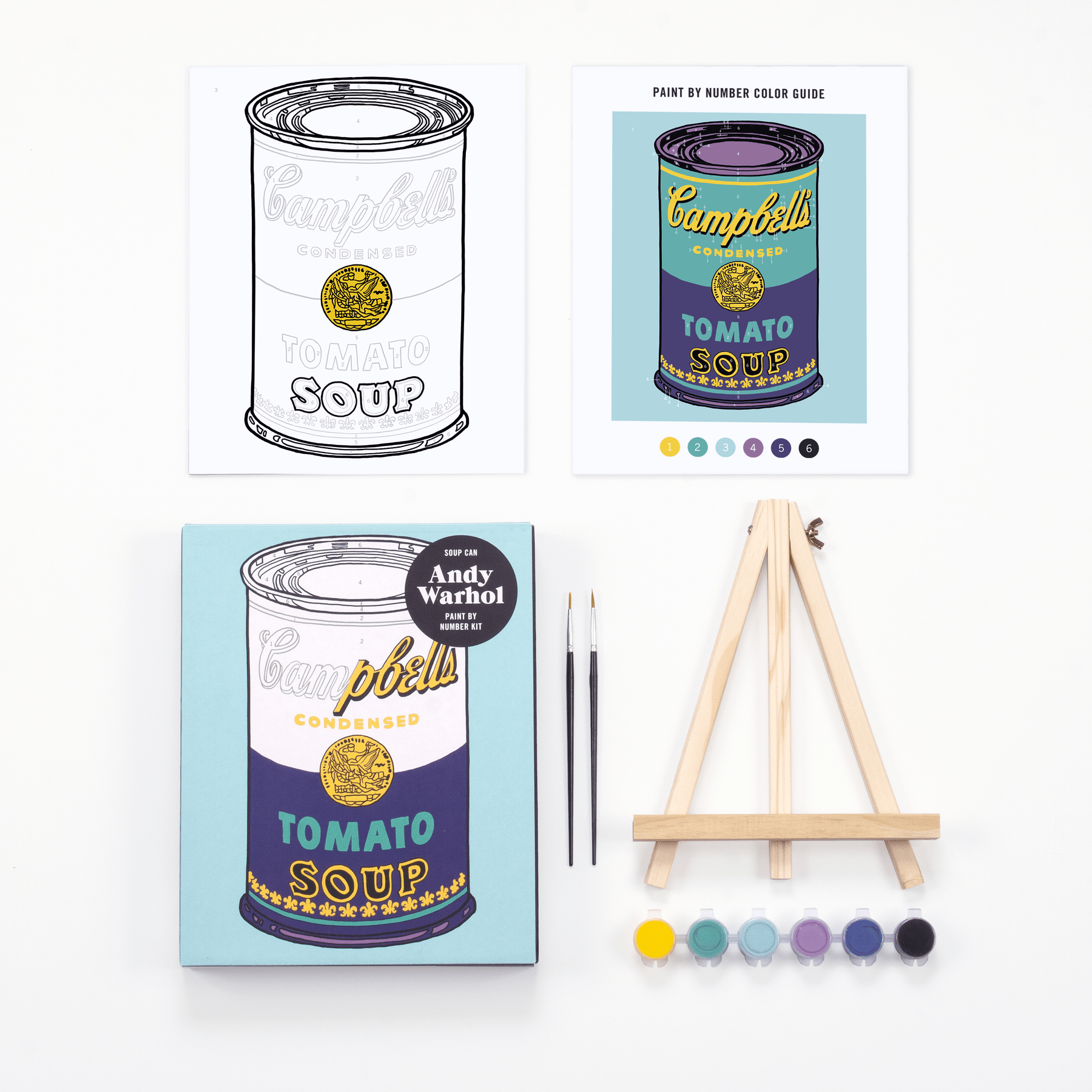 Campbell's Soup can art set with paint, brushes, and color swatches on a white background