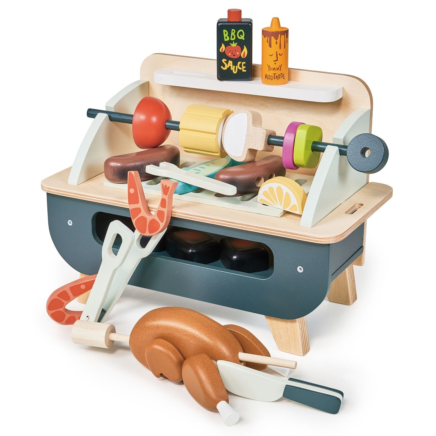 Toy barbecue set with various accessories on a white background