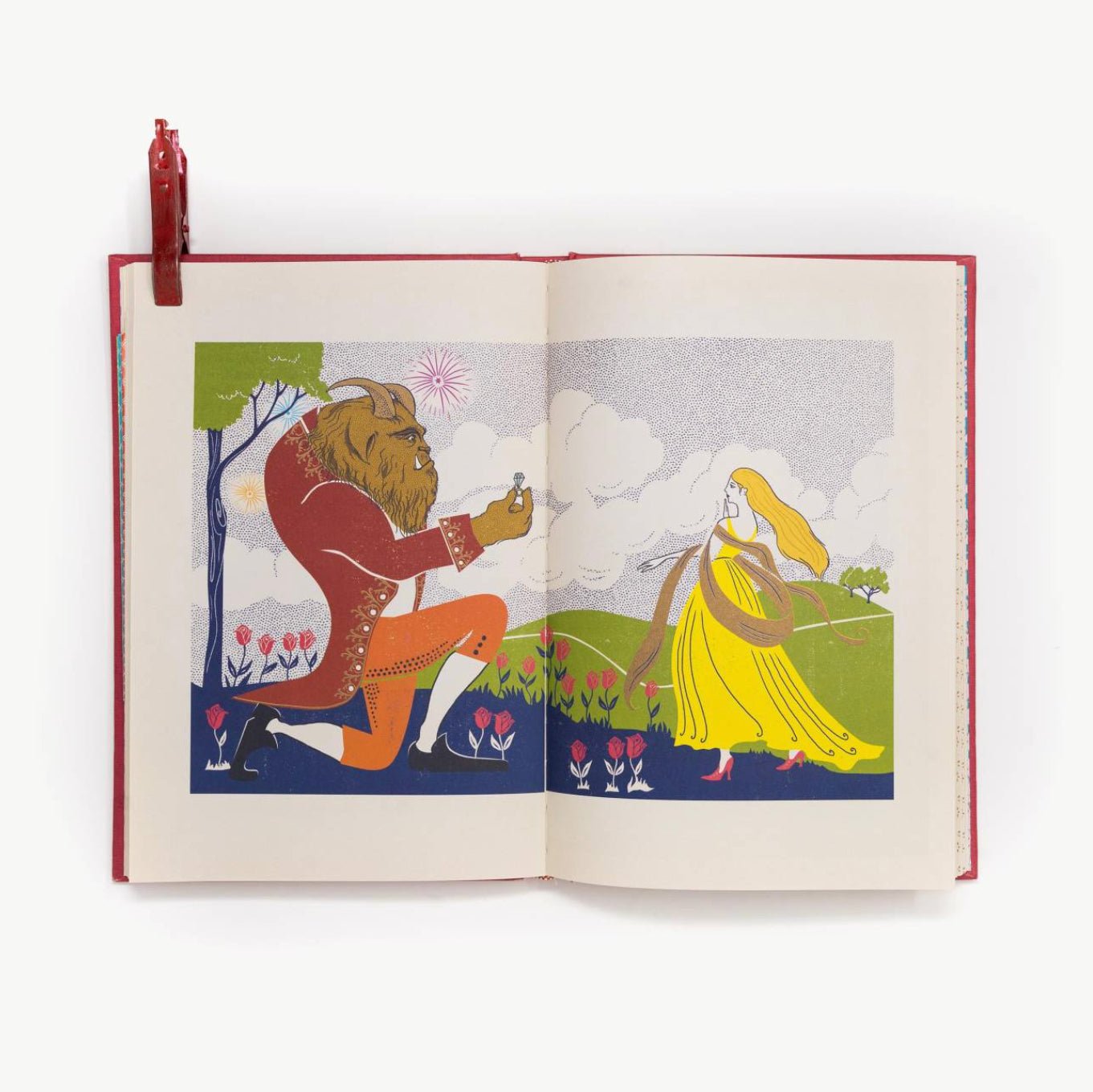 Open book with illustrations of a Beast and a Princess on a white background
