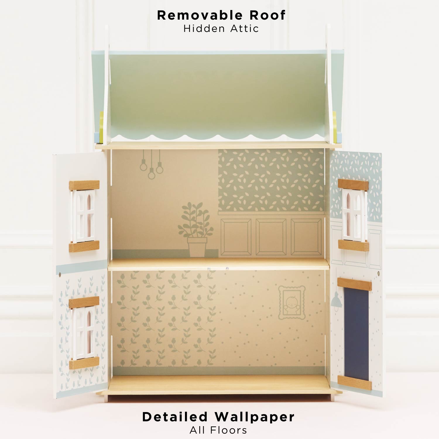 Model of a dollhouse with a removable roof and detailed interior.