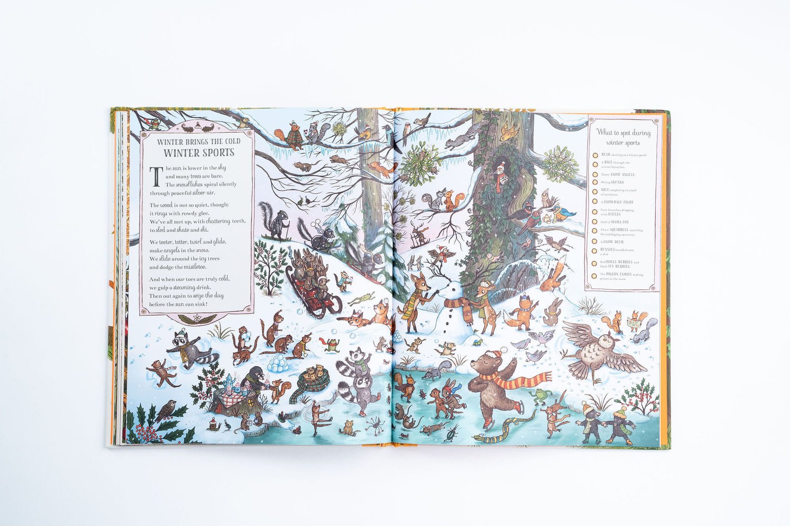 Open book with illustrations of animals in a forest setting on a white background