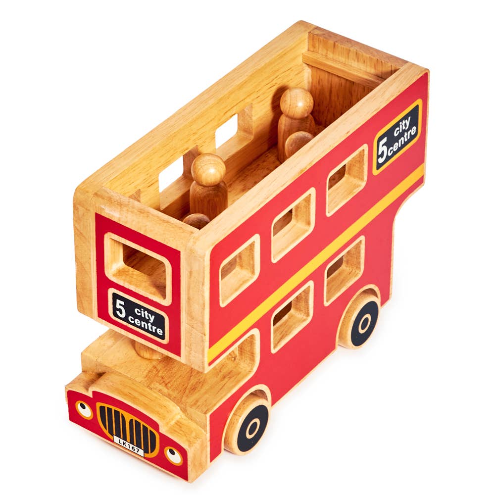 Wooden toy bus with a red body and yellow roof on a white background