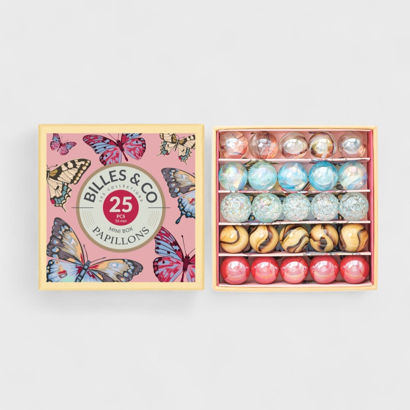 Box of colorful marbles with 'Billes & Co' branding on a light gray background