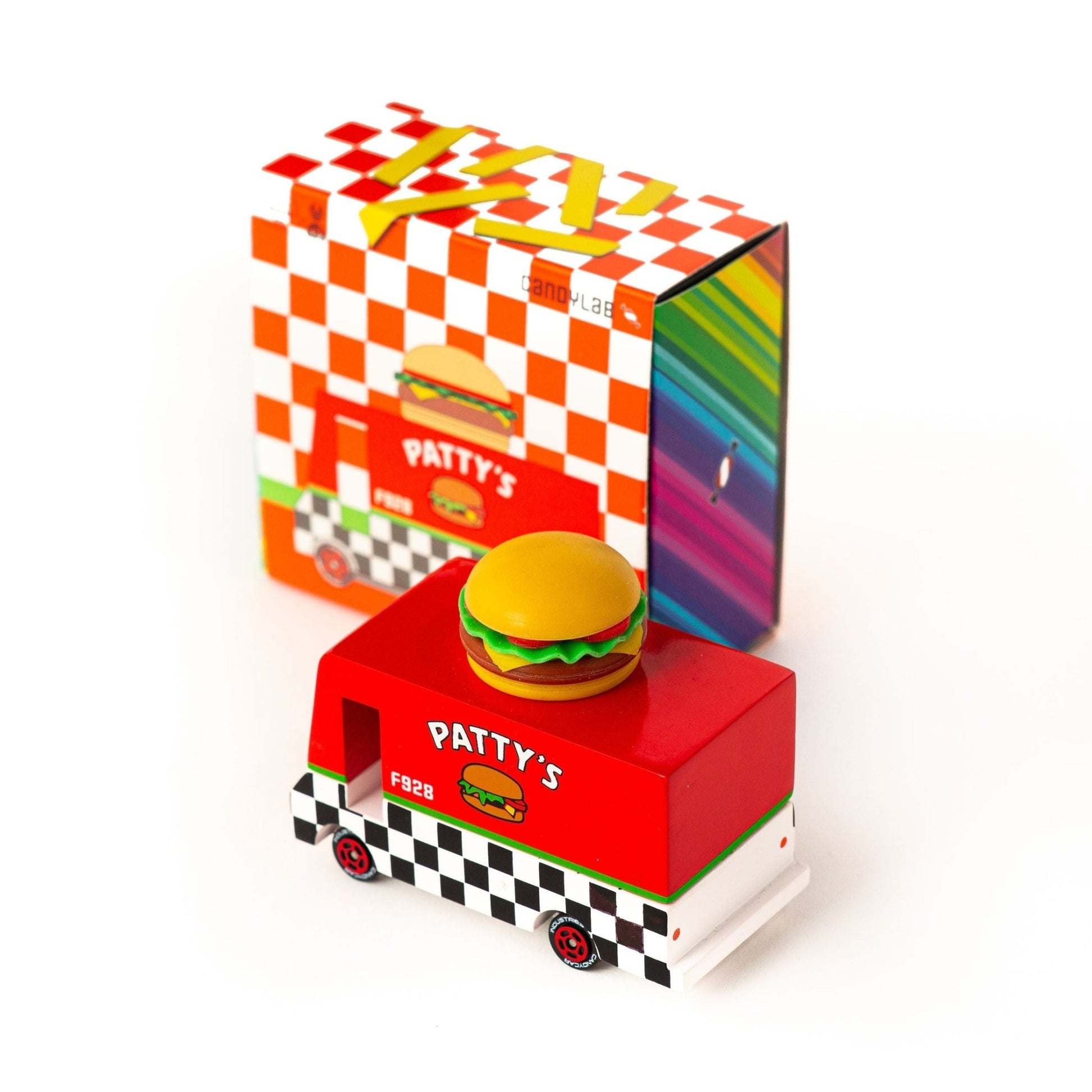 Colorful toy truck with a hamburger design on a white background