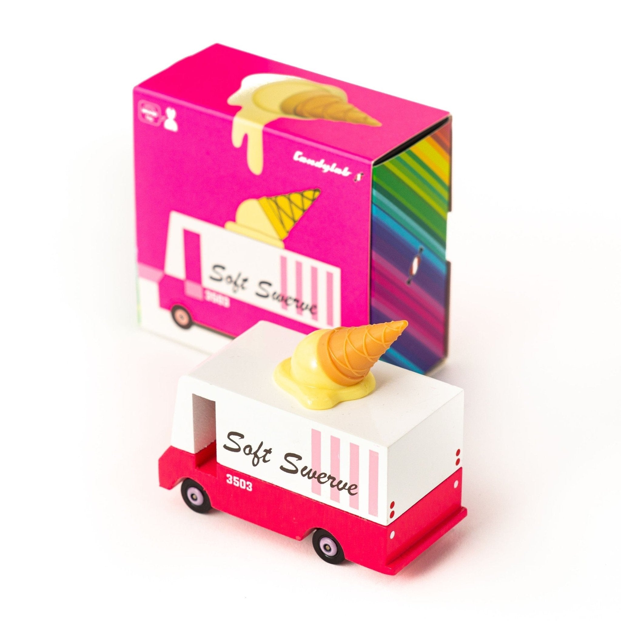 Small toy ice cream truck with a pink box featuring ice cream graphics on a white background
