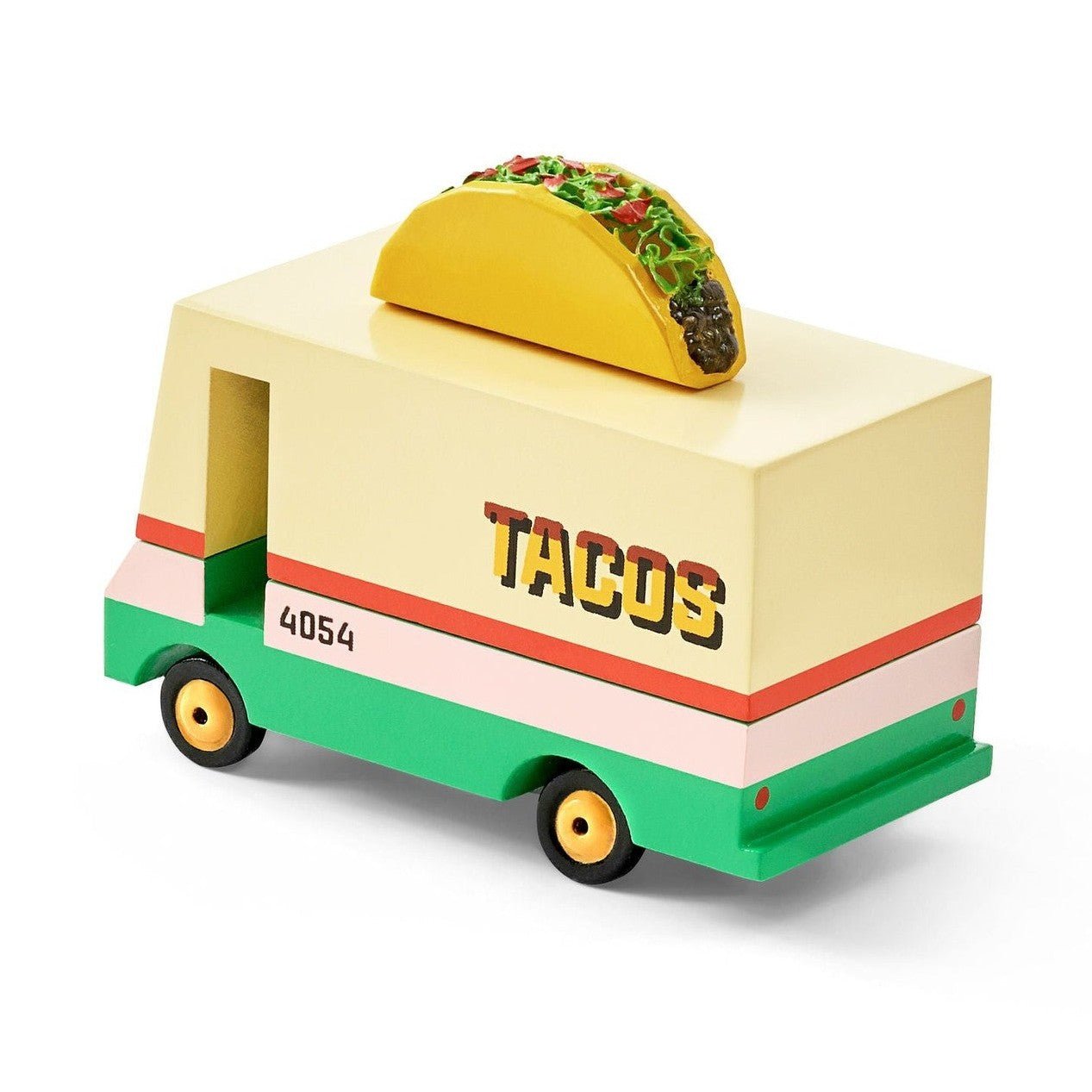 Toy truck with a taco on top against a white background