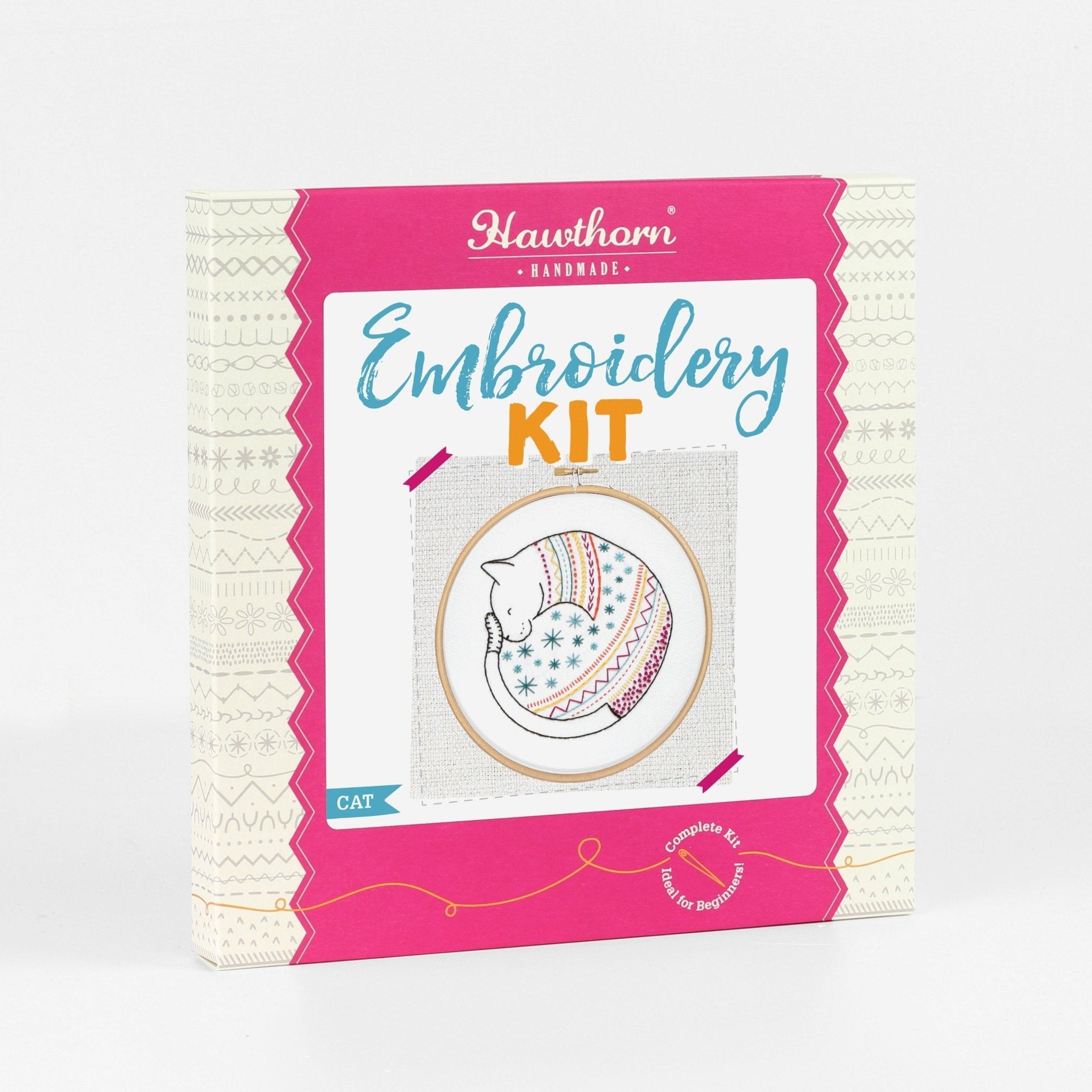 Embroidery kit packaging with pink border and white background