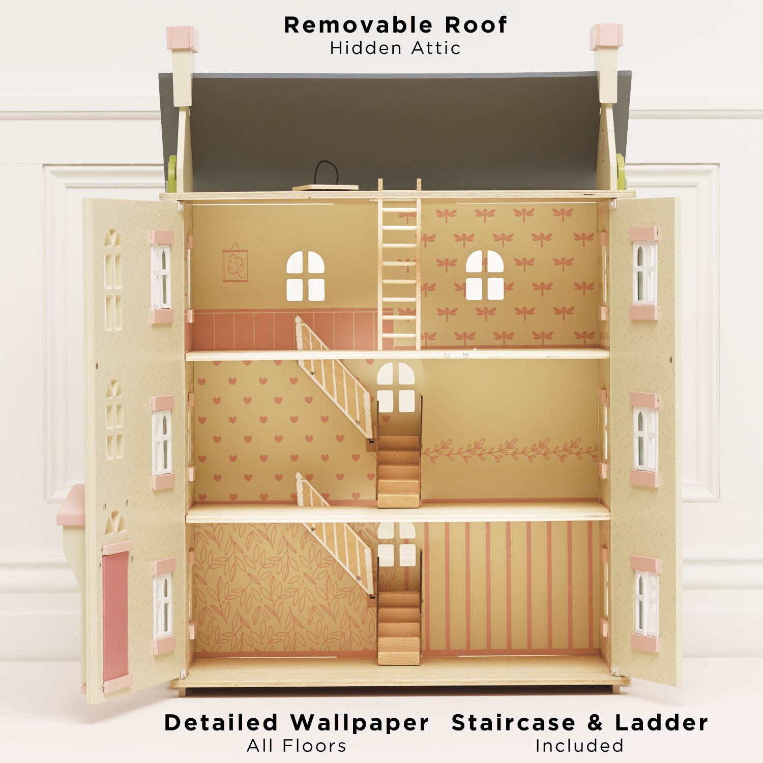 Toy dollhouse with removable roof, staircase, and ladder on a white background