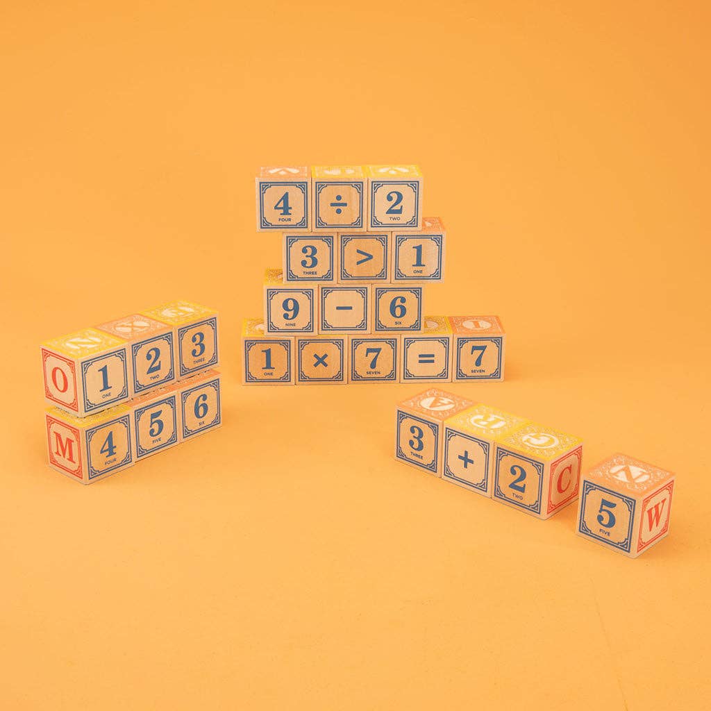 Educational wooden blocks with numbers and letters on an orange background