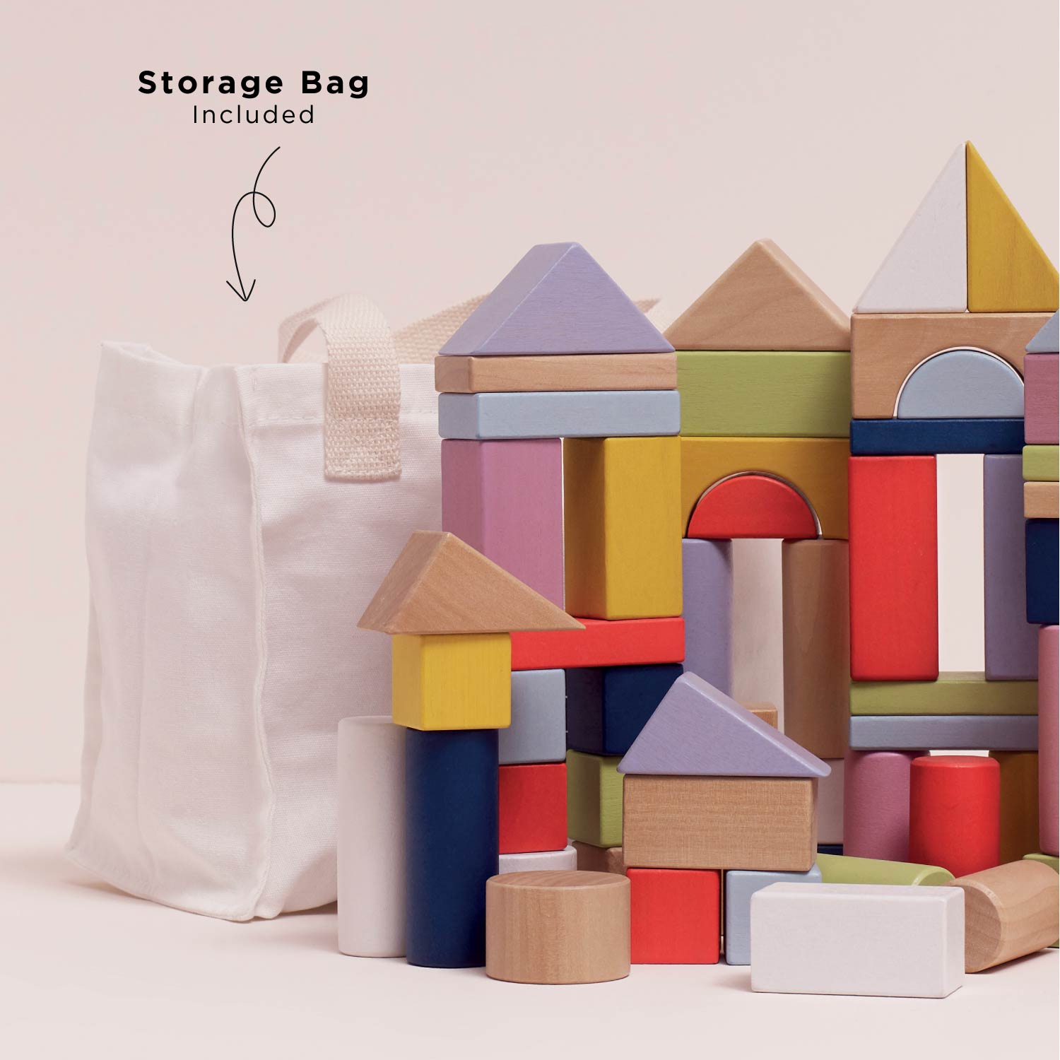 Colorful wooden blocks with a storage bag on a light background