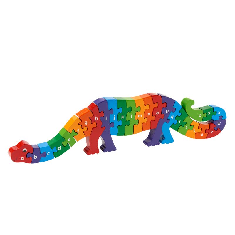 Colorful dinosaur-shaped puzzle toy with letters on a white background