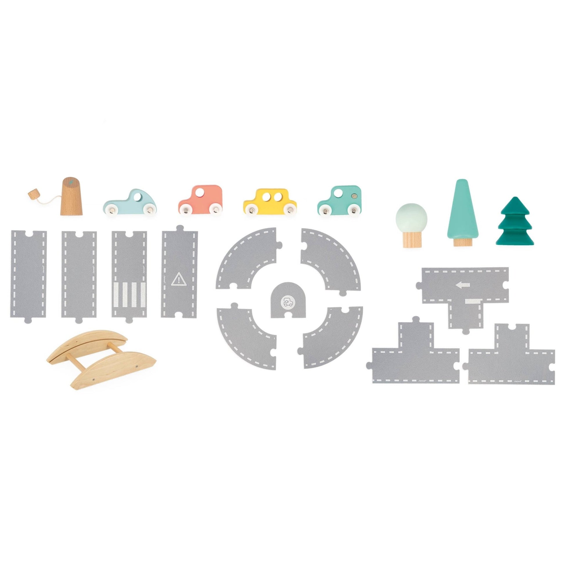 Collection of toy track pieces and small vehicles on a white background