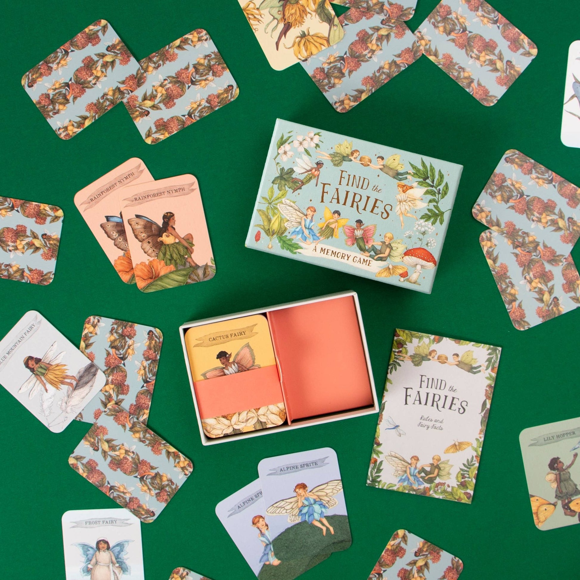 'Find the Fairies' memory game with cards and box on a green background