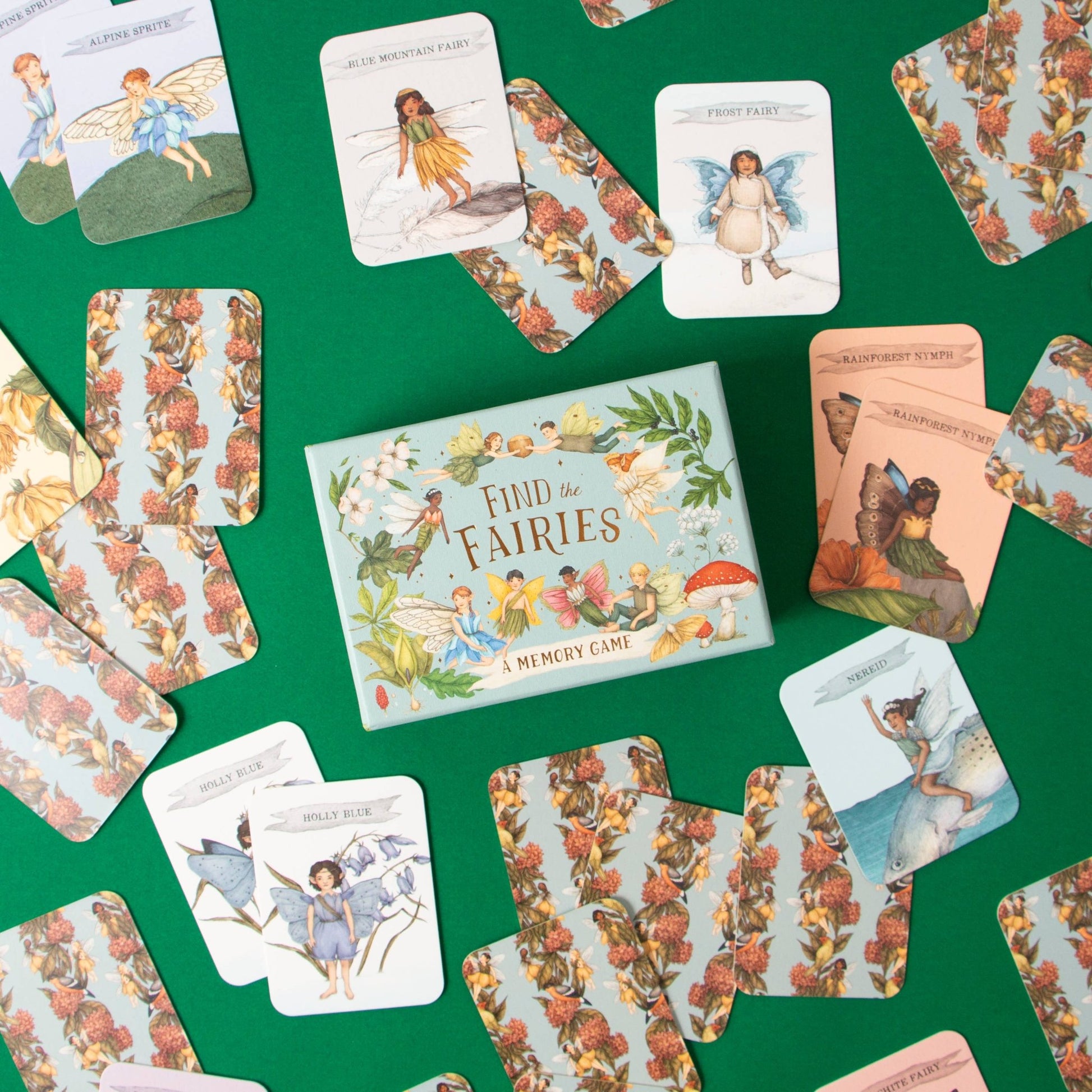 Vintage-style 'Find the Fairies' memory game cards on a green background