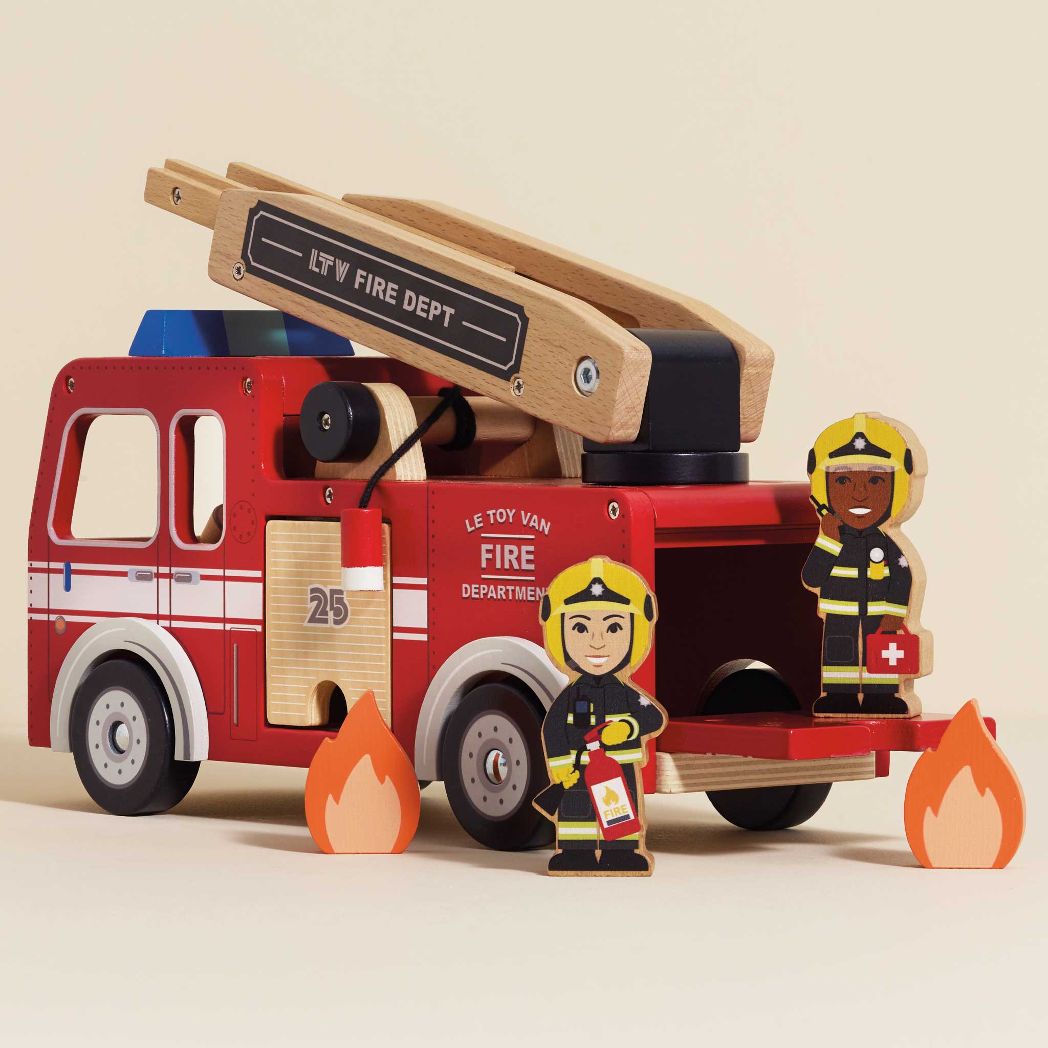 Wooden toy fire truck with firefighters and flames on a beige background