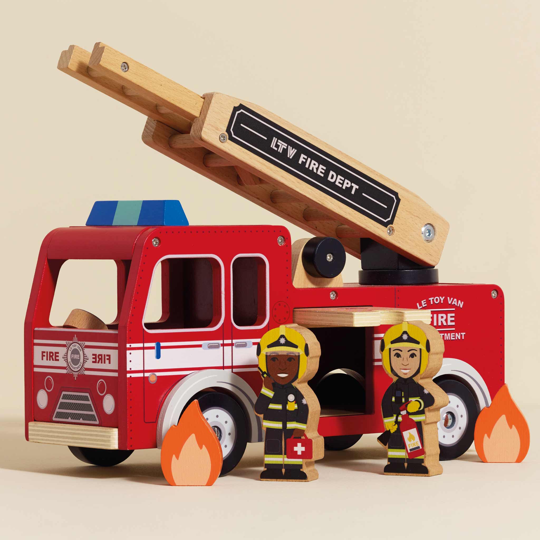 Wooden toy fire truck with a ladder, two fireman figures, and flames on a beige background.