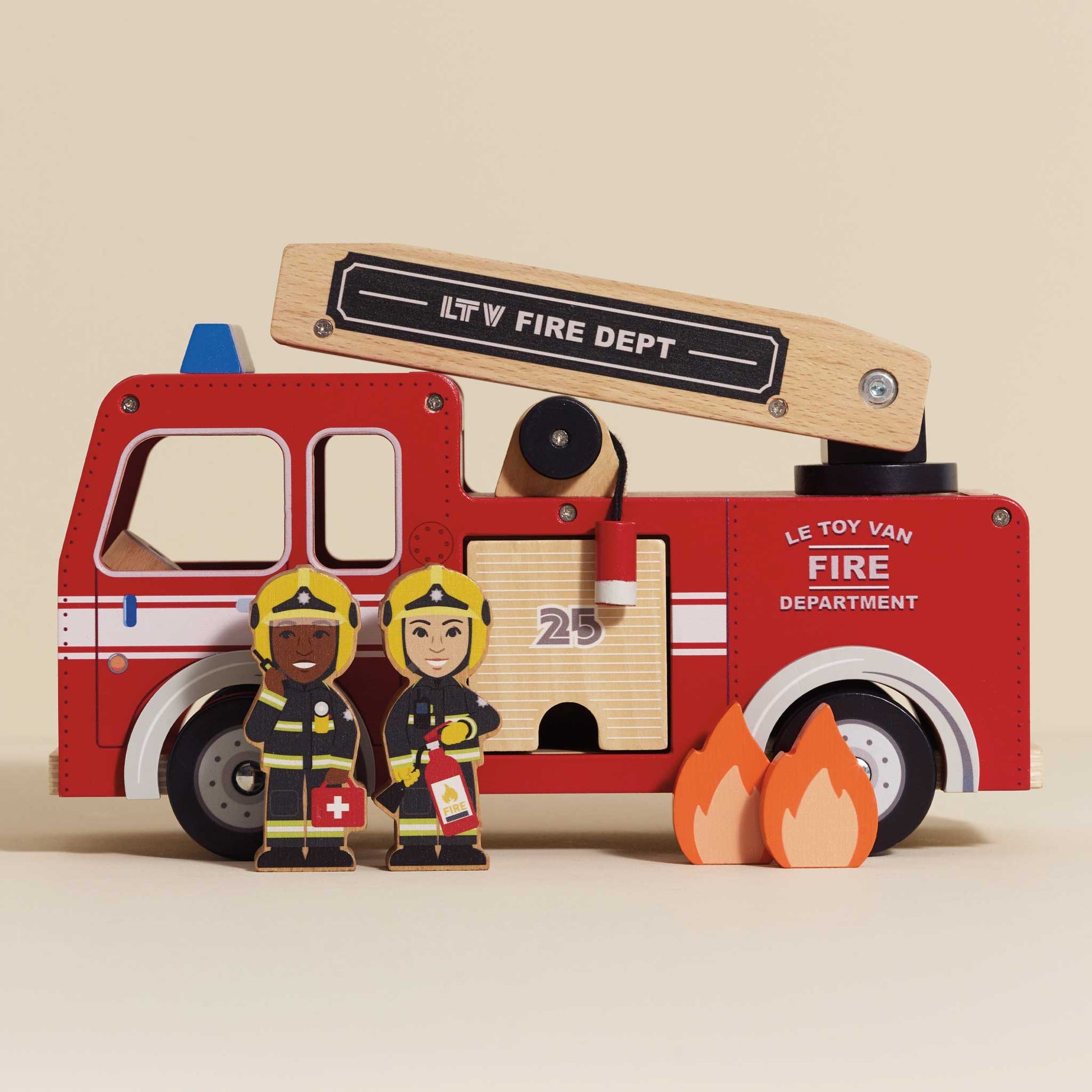 Wooden toy fire truck with firefighters and flames on a beige background