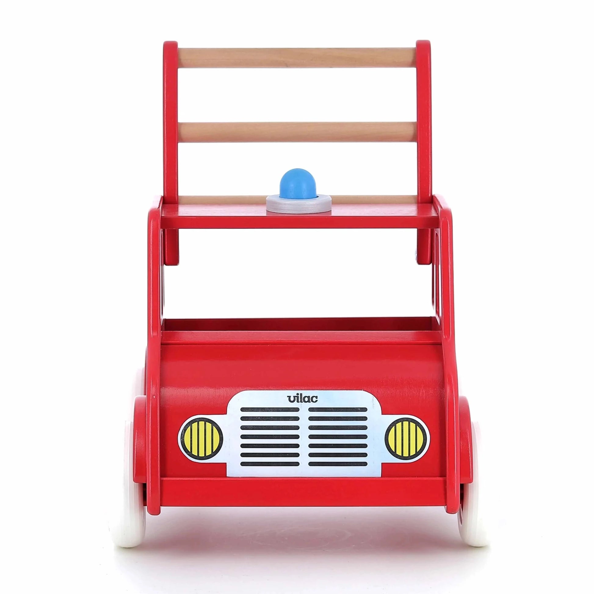 Red toy fire truck with wooden ladder and blue ball on a white background