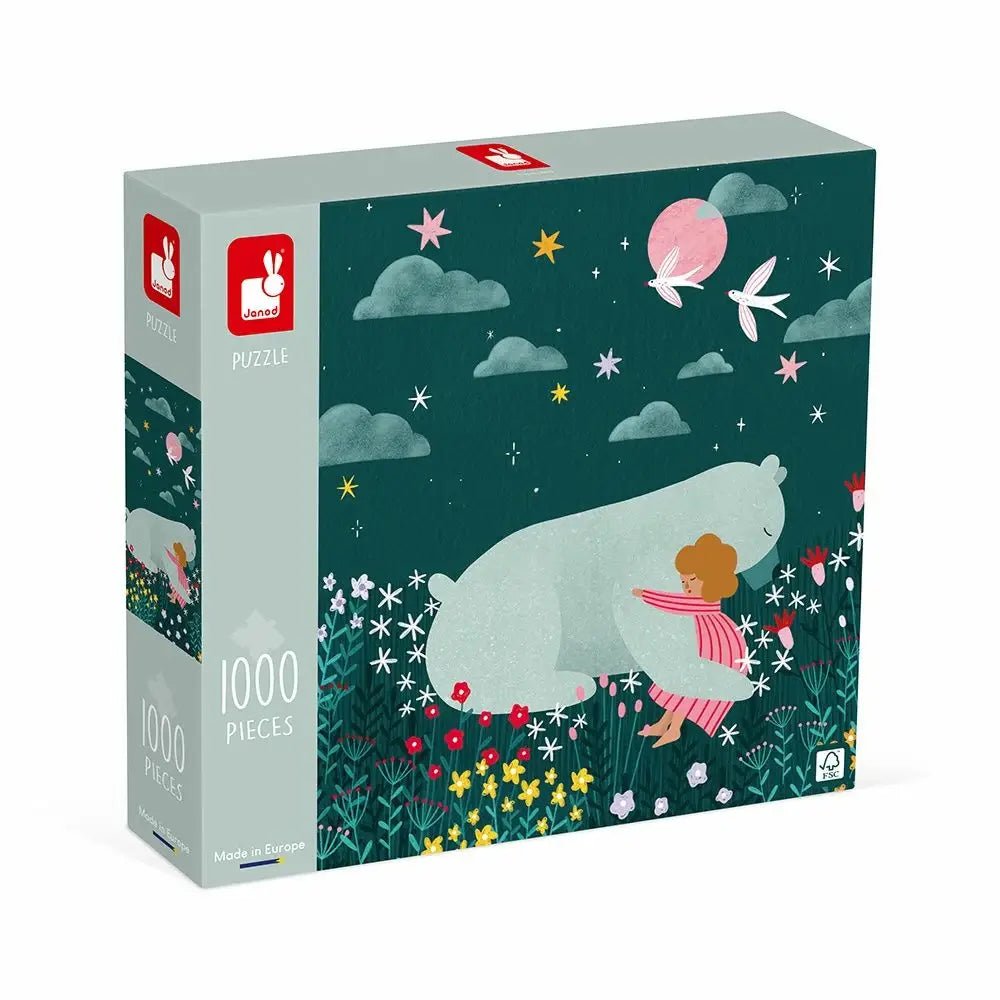 Puzzle box with a whale and child illustration on a dark green background