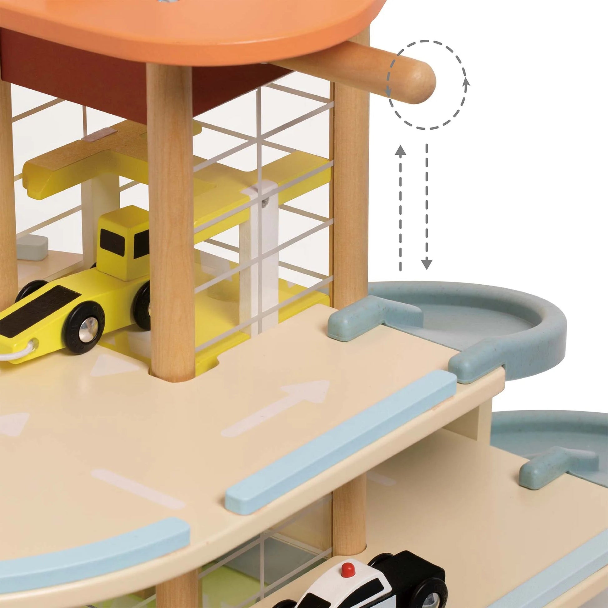 Wooden toy garage with multiple levels and a yellow car on an elevated platform.