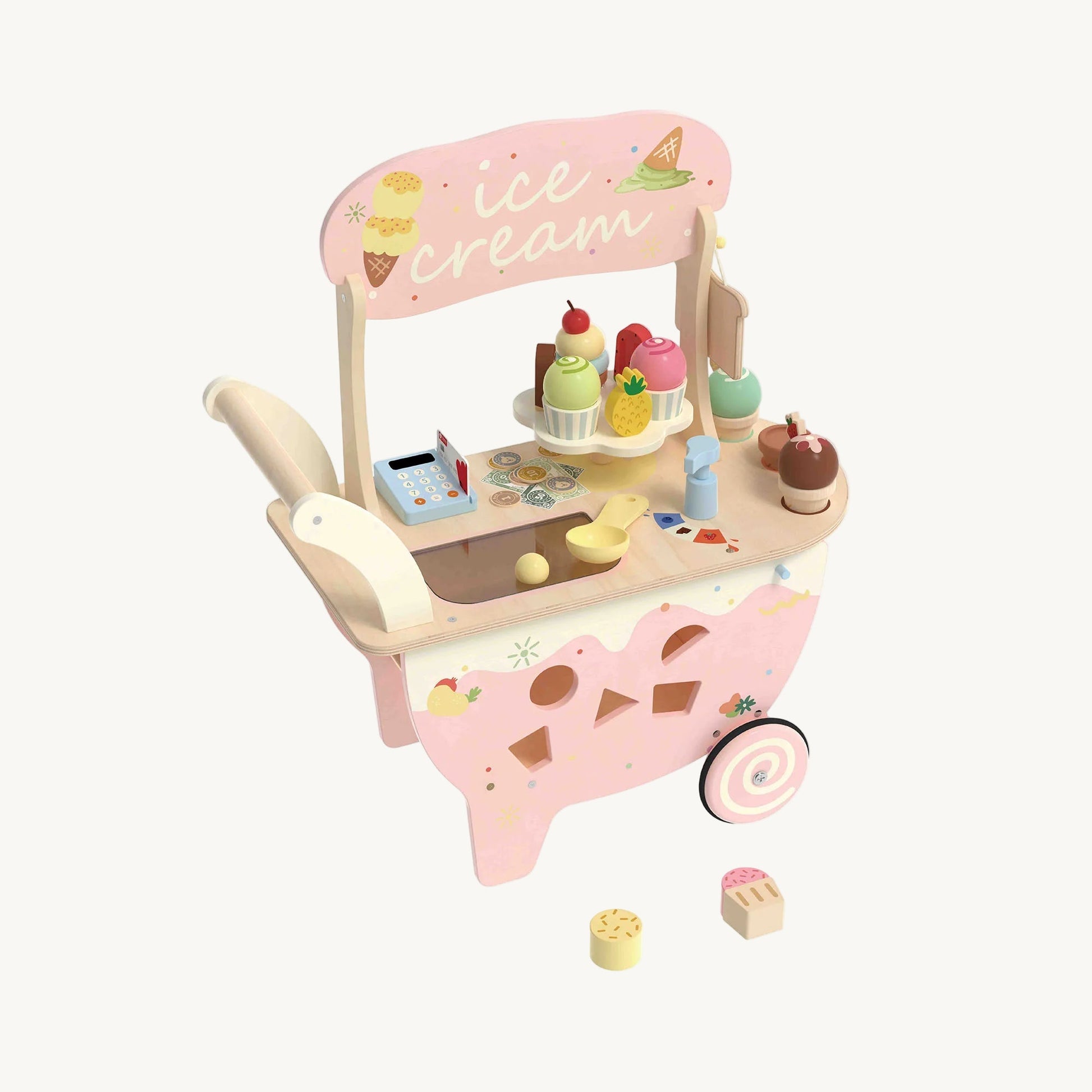 Toy ice cream cart with various ice cream cones on a white background