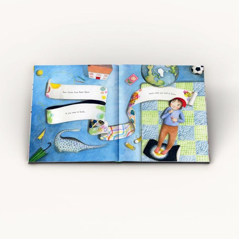 Open book with colorful illustrations on a white background