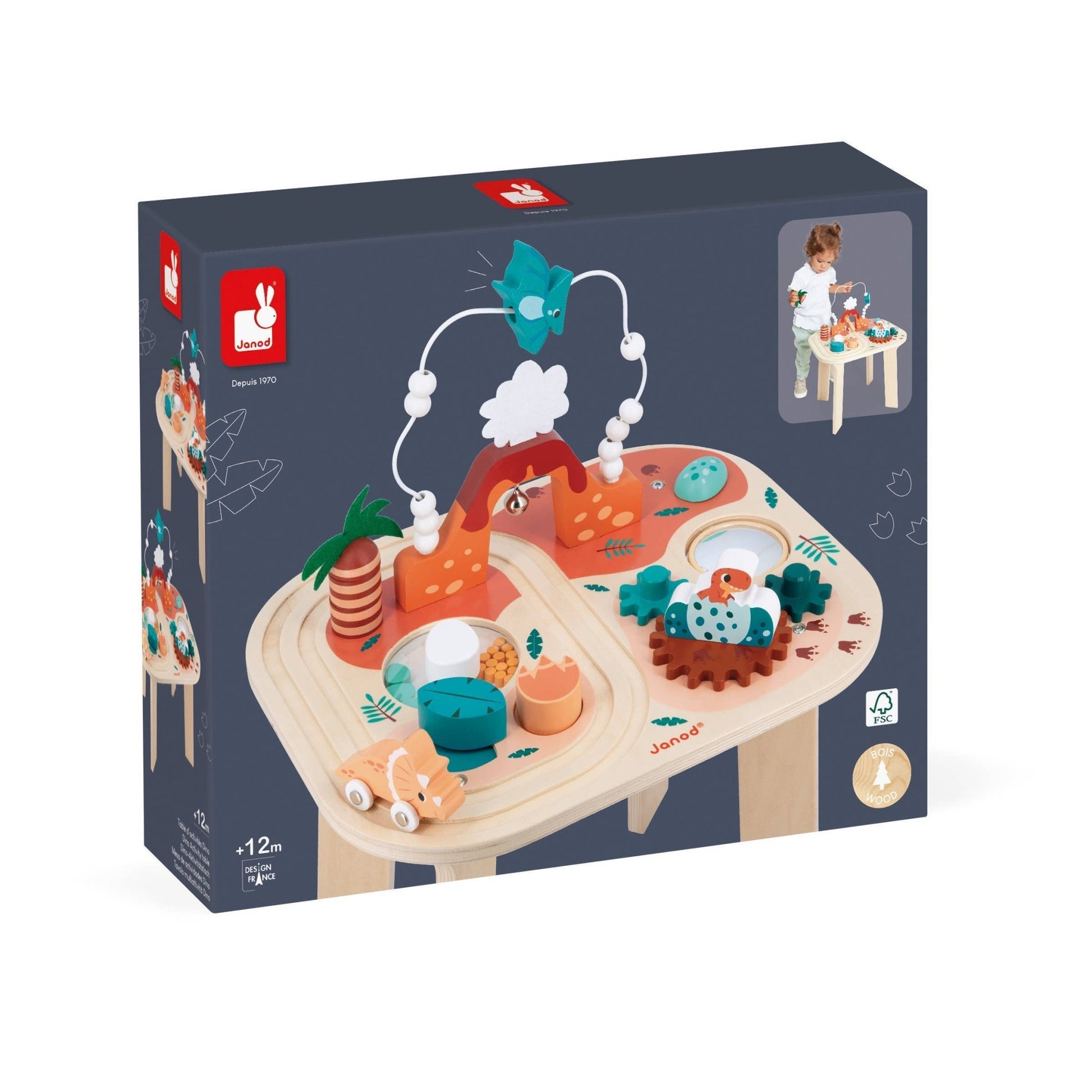 Toy packaging with wooden playset and colorful elements on a white background