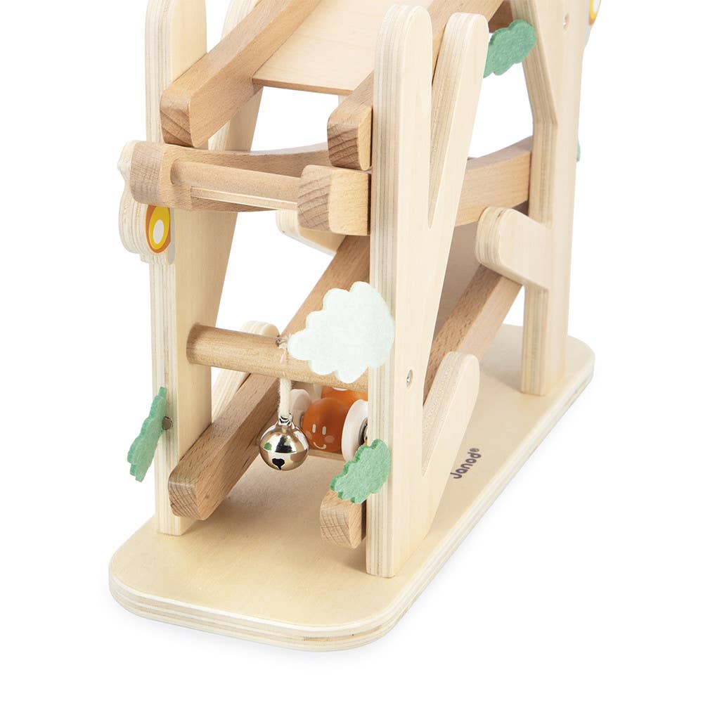 Wooden pet toy with multiple levels and interactive elements on a white background