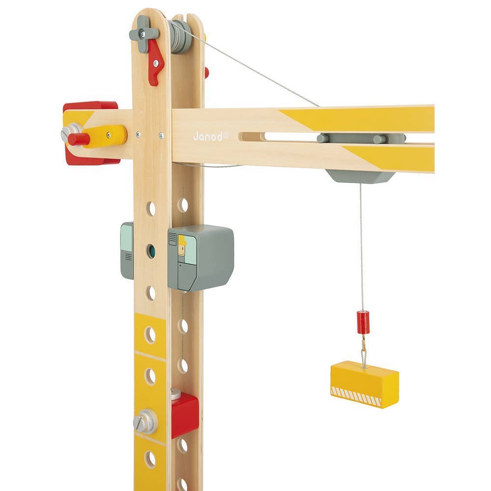 Toy crane with yellow and red accents on a white background