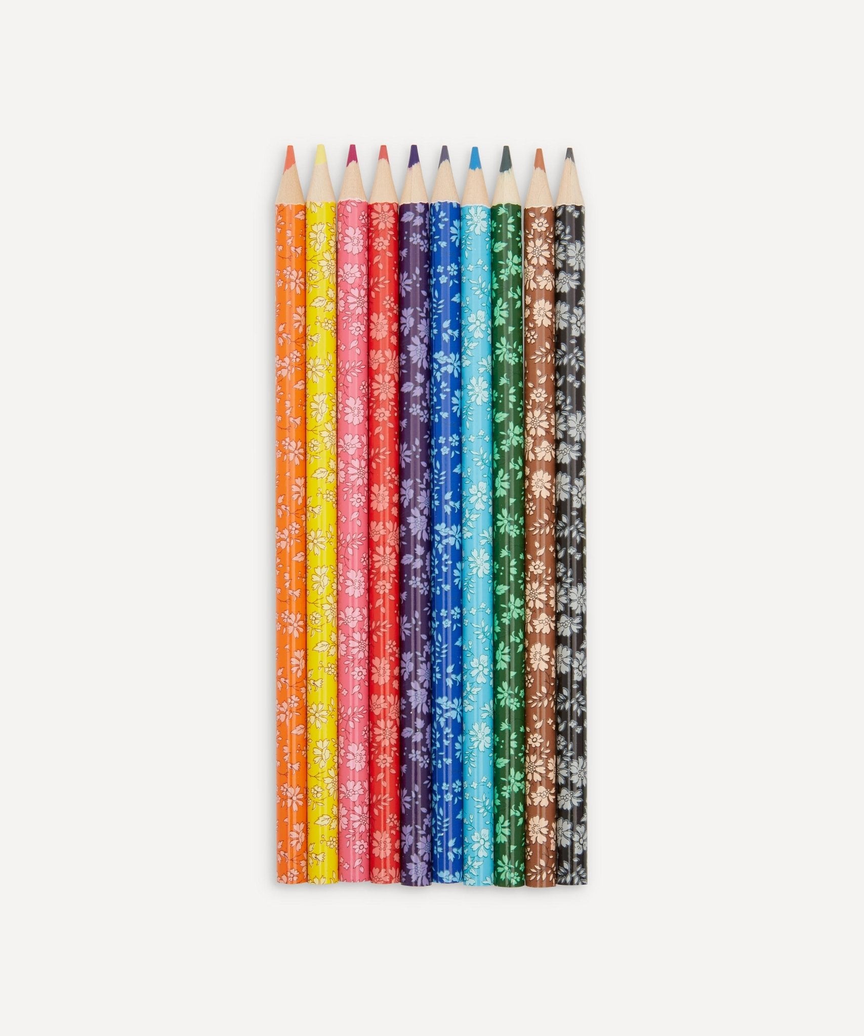 Set of colorful pencils with floral designs on a white background