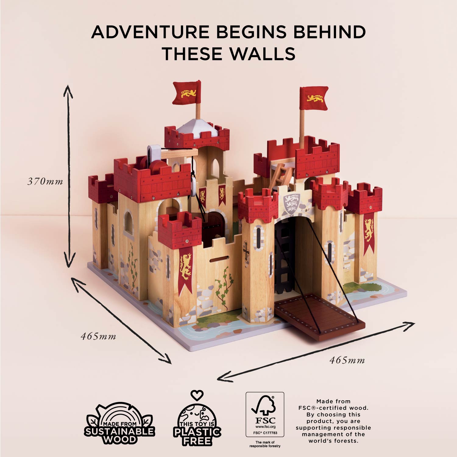 Toy castle with red towers and flags, labeled 'Adventure Begins Behind These Walls', on a beige background.