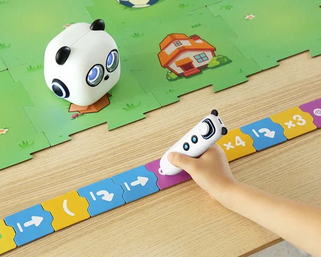 Educational toy with panda character on a wooden table