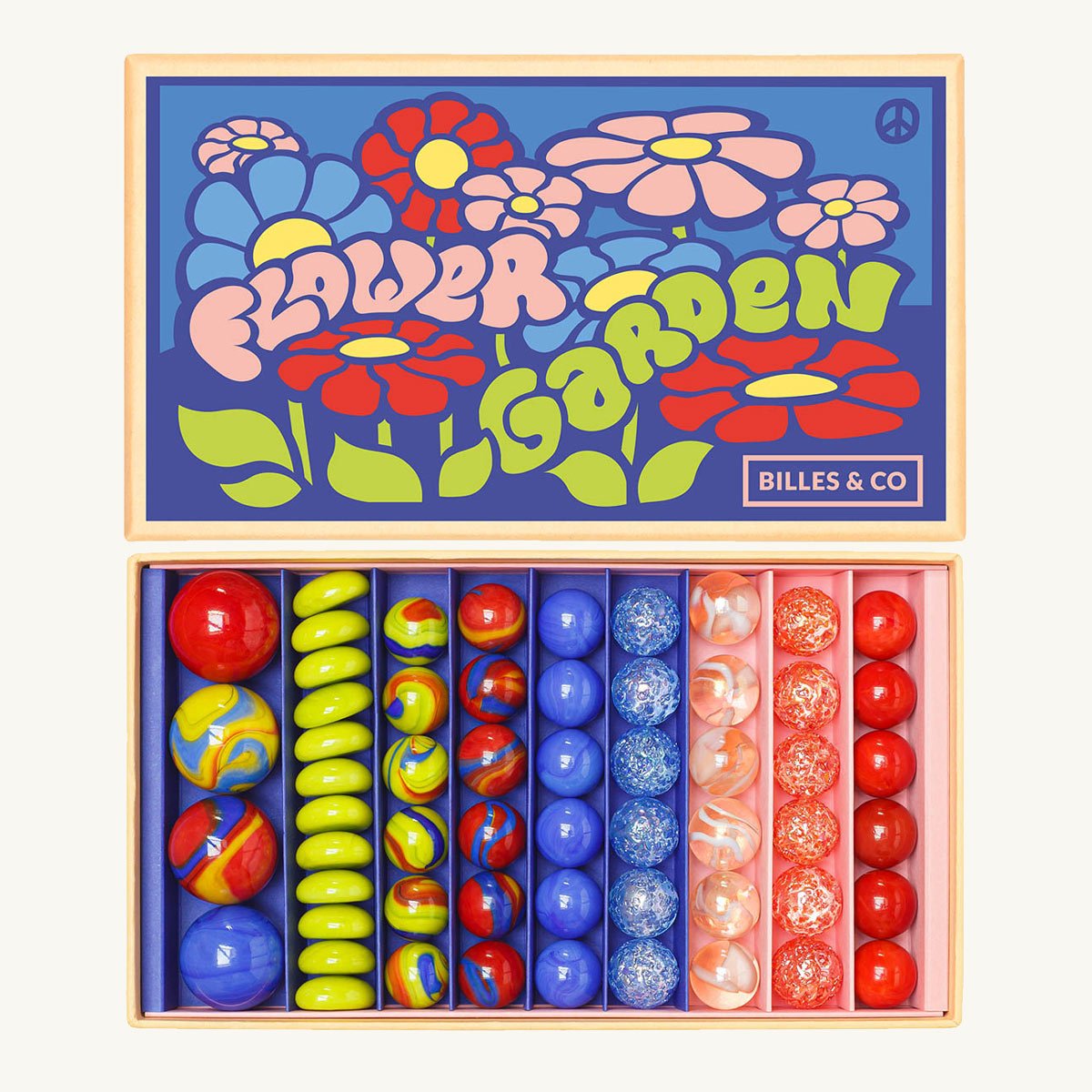 Colorful marbles in a wooden box with 'Flower Garden' design and 'Billes & Co' branding.