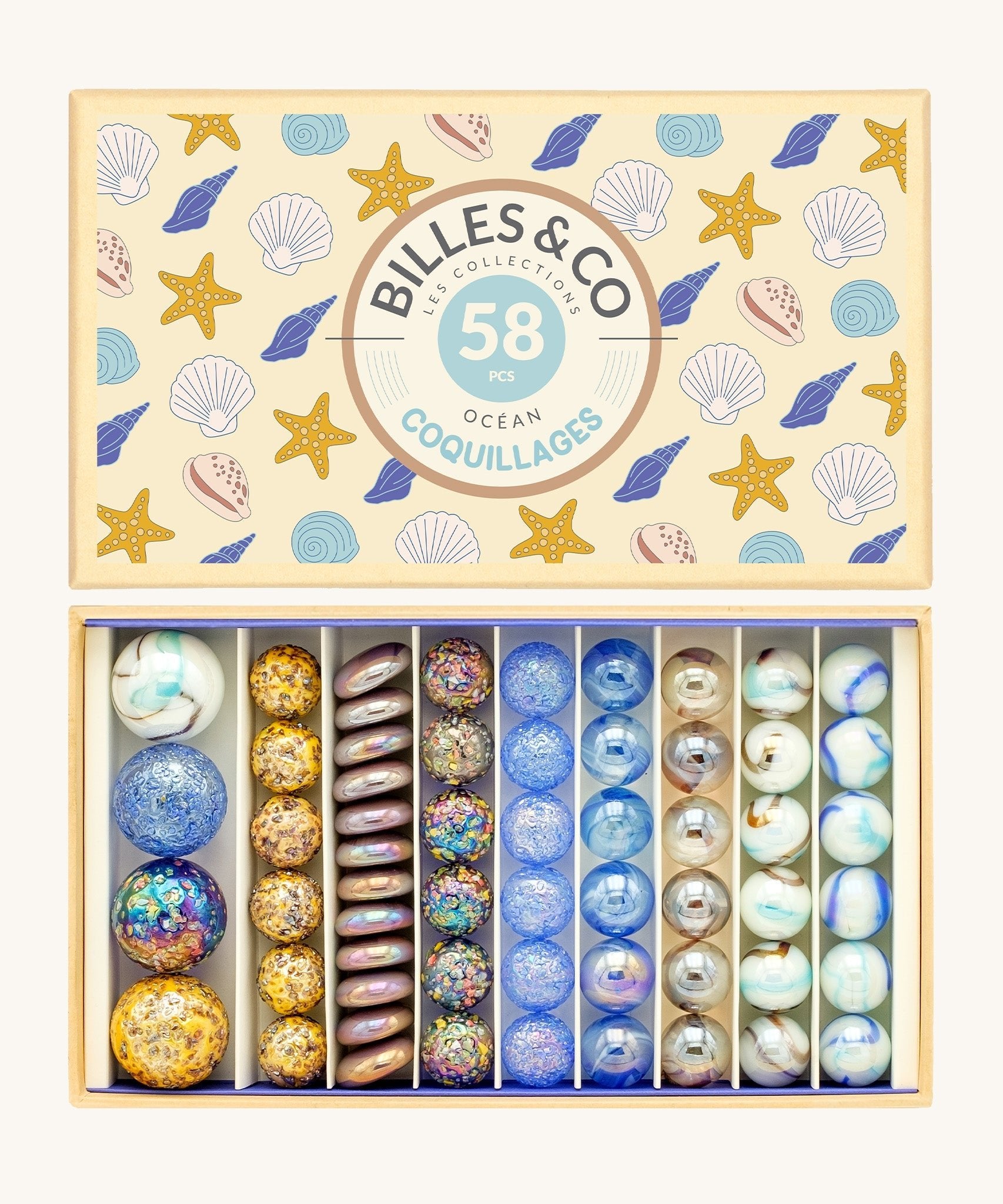 Box of decorative shells with 'Billes & Co' branding and various shell designs.
