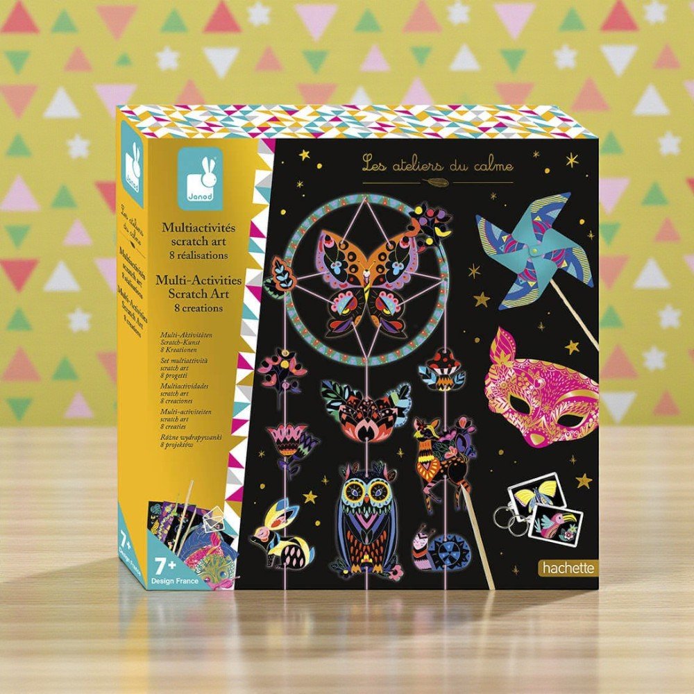 Scratch art kit packaging with colorful designs on a patterned background