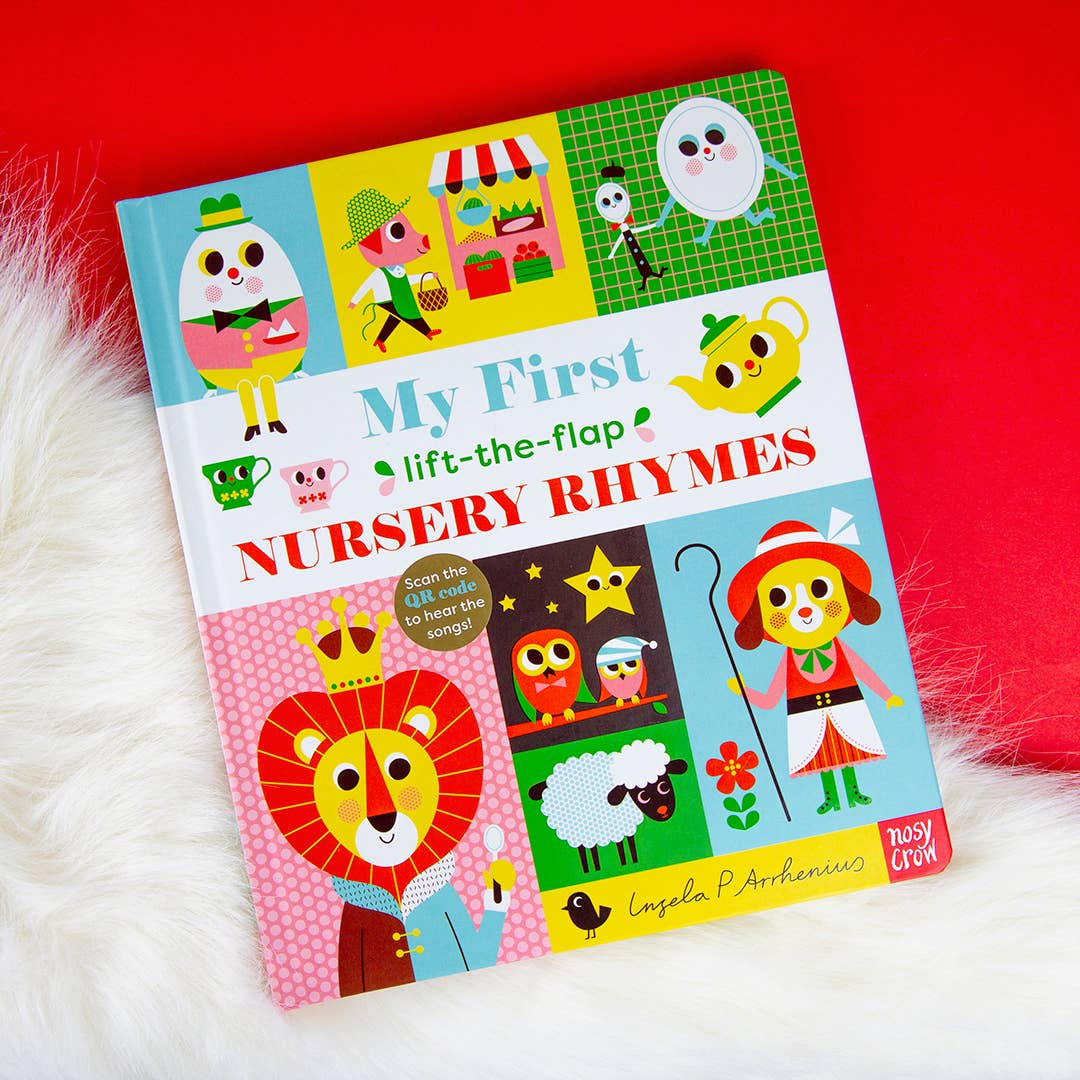 Children's book titled 'My First Lift-the-Flap Nursery Rhymes' on a red and white fur background
