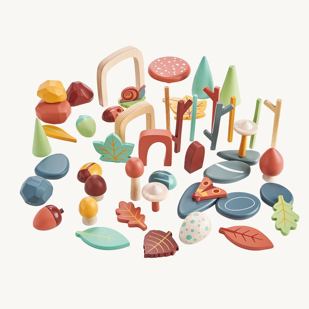 Set of colorful wooden toys on a white background