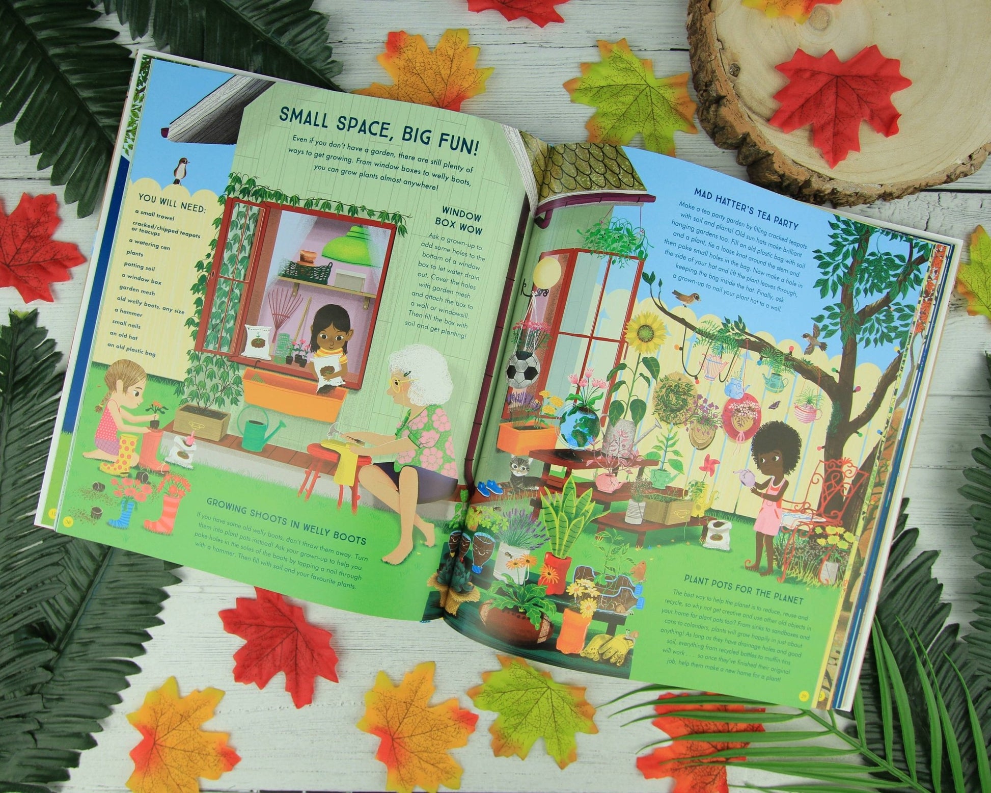 Open children's book with colorful illustrations on a wooden surface with autumn leaves.